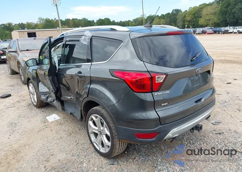 2019 Ford Escape Titanium z USA, uszkodzony, nr VIN 1FMCU0J99KUC17133